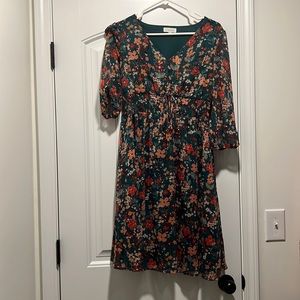 Floral knee length dress. Worn once. Size M great condition